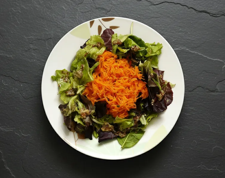 Salad styled in outdoor garden setting